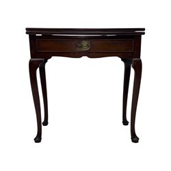 Late 19th century black-painted cane seat chair; early 20th century radial spindle-back chair with green upholstery; early 20th century mahogany single-drawer side table; mid-20th century carved wooden stool with harp motif; early 20th century hexagonal bamboo stand; two oval mirrors (7)