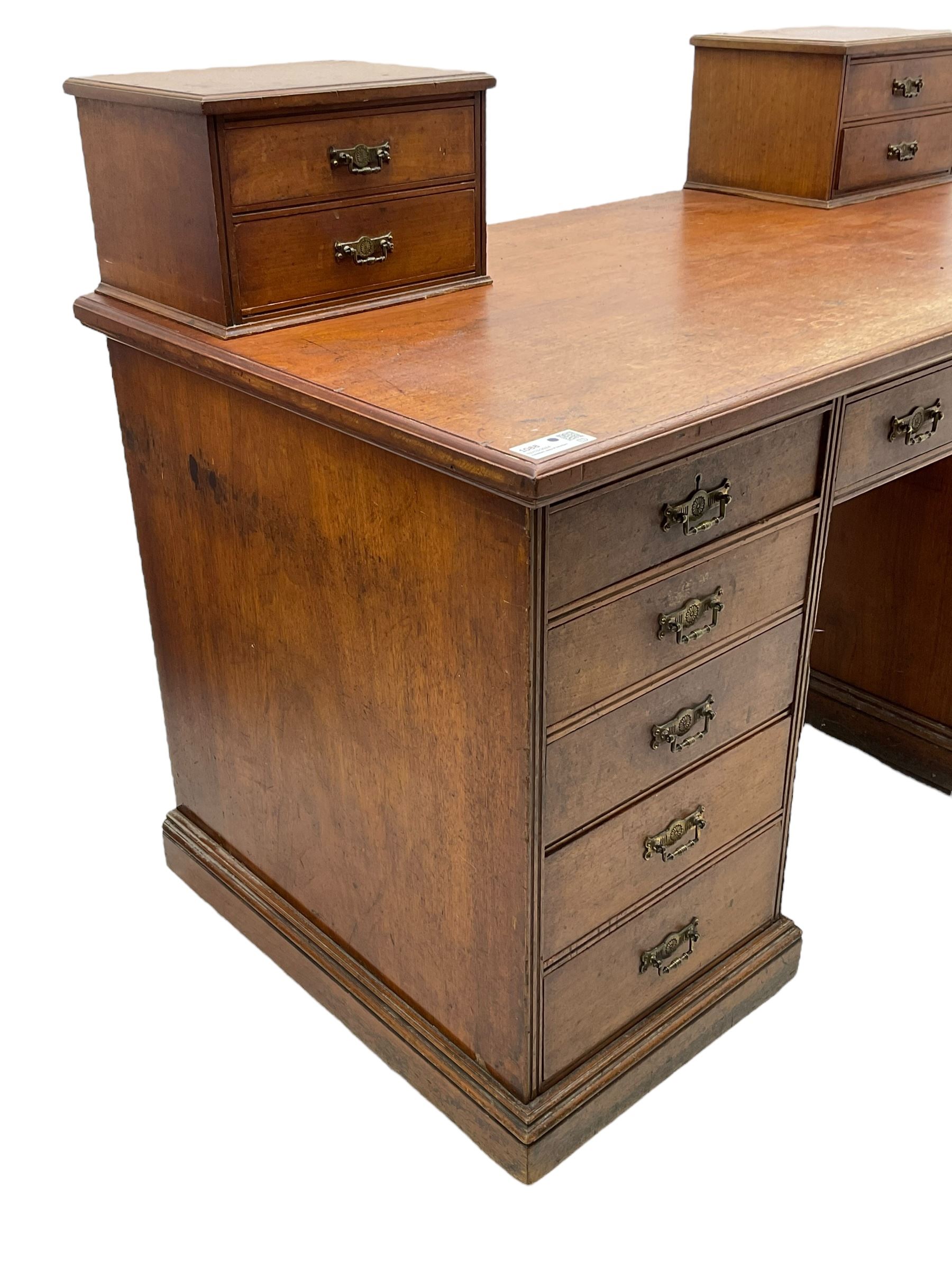 C. Hindley & Sons (London: 1820-1892) - Late Victorian walnut twin pedestal desk, the rectangular moulded top surmounted by two banks of two drawers over eleven graduating drawers, on moulded plinth base, the central drawer stamped 'C. Hindley & Sons, 134 Oxford Street, London, 5298'