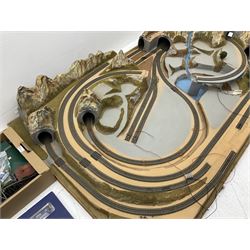 '00' gauge - table-top moulded plastic model railway layout with various rocky outcrops, tunnels, waterfall to lake, loops of Fleischmann track supplemented by Hornby track, bridges, kit built buildings and other accessories; together with Bachmann Class 150 2-car DMU Set and Hornby Northern Rail Class 142 2-car Set; both boxed; and small quantity of other rolling stock, three controllers etc  200 x 120cm