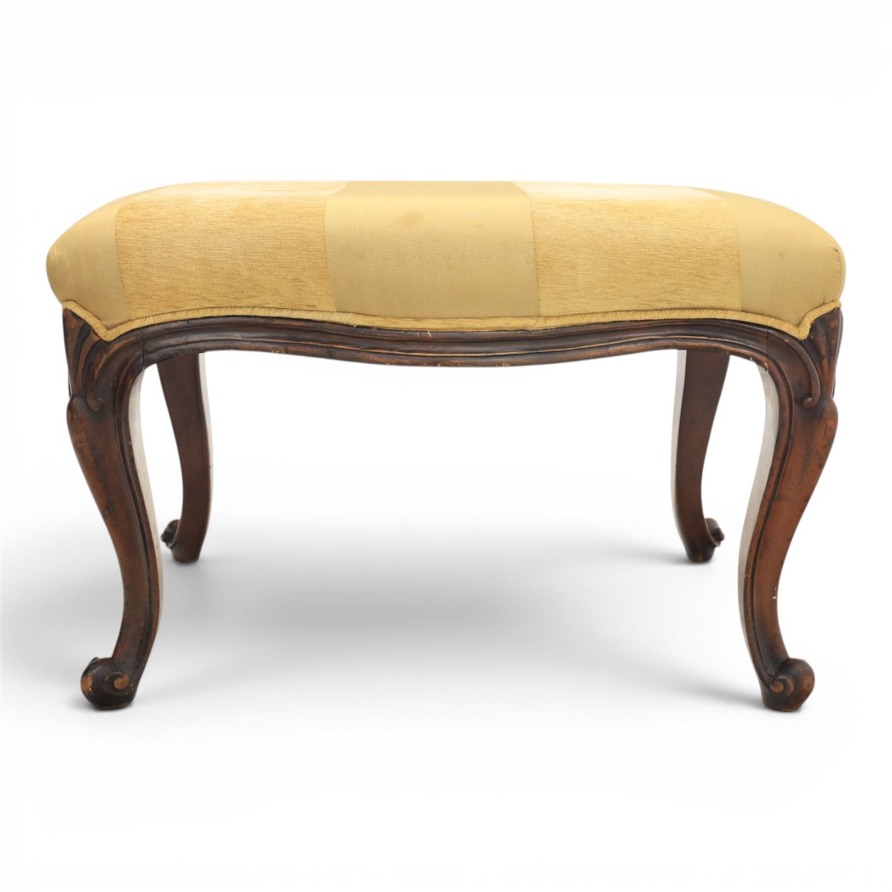 Victorian mahogany Cayley style footstool, serpentine upholstered seat raised on cabriole supports terminating in scroll feet