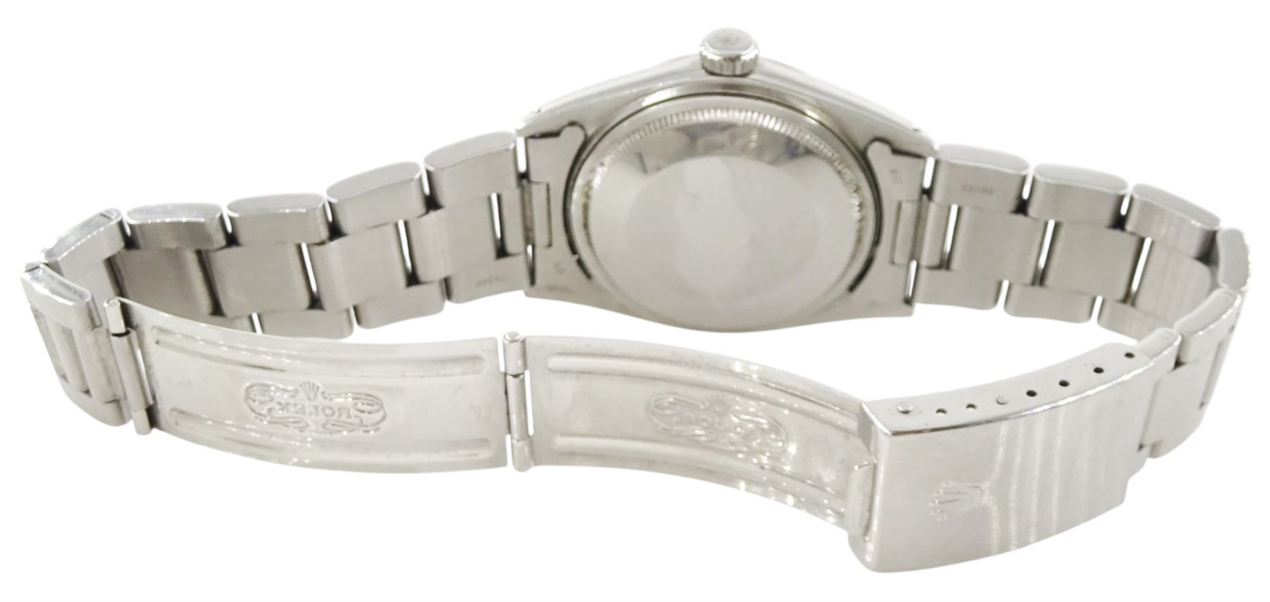 Rolex Oyster Perpetual DateJust gentleman's automatic wristwatch, circa 1970, Ref. 1600, serial No. 2565534, silvered dial with baton hour markers and date aperture, on Rolex Oyster stainless steel bracelet, with fold-over clasp, boxed with papers