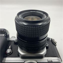 Nikon F2A Photomic camera body, serial no. 7844439, with 'Nikon Zoom-NIKKOR 35-70mm 1:3.5-4.8' lens, serial no. 5352031, Nikon MD1 Motor Drive, serial no. 208608 and Nikon MB1 battery pack