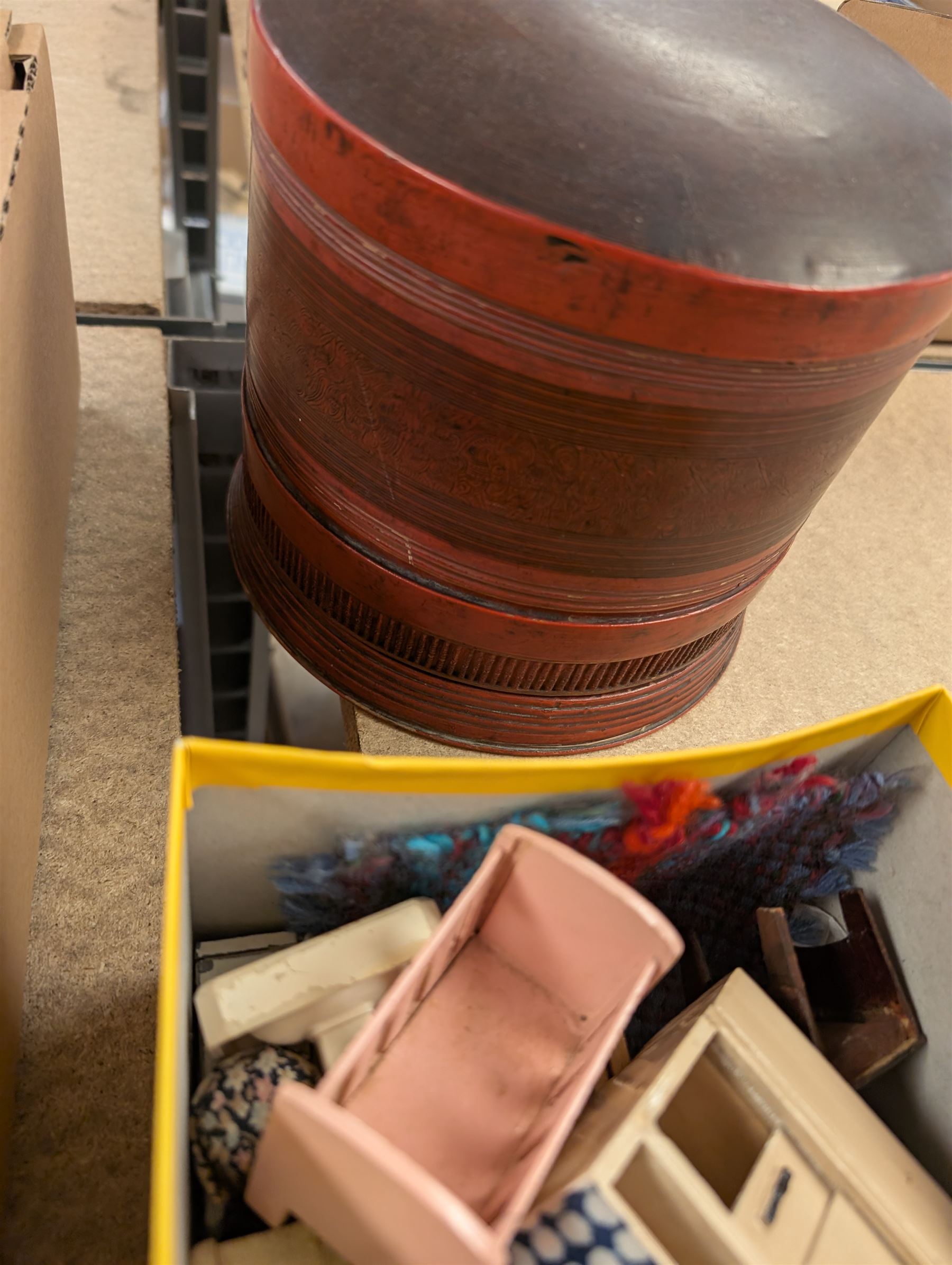Burmese red lacquer circular box, pewter coffee pot, wooden book slide and circular photograph frames, thimbles including silver example, sampler and a small collection of vintage dolls house furniture