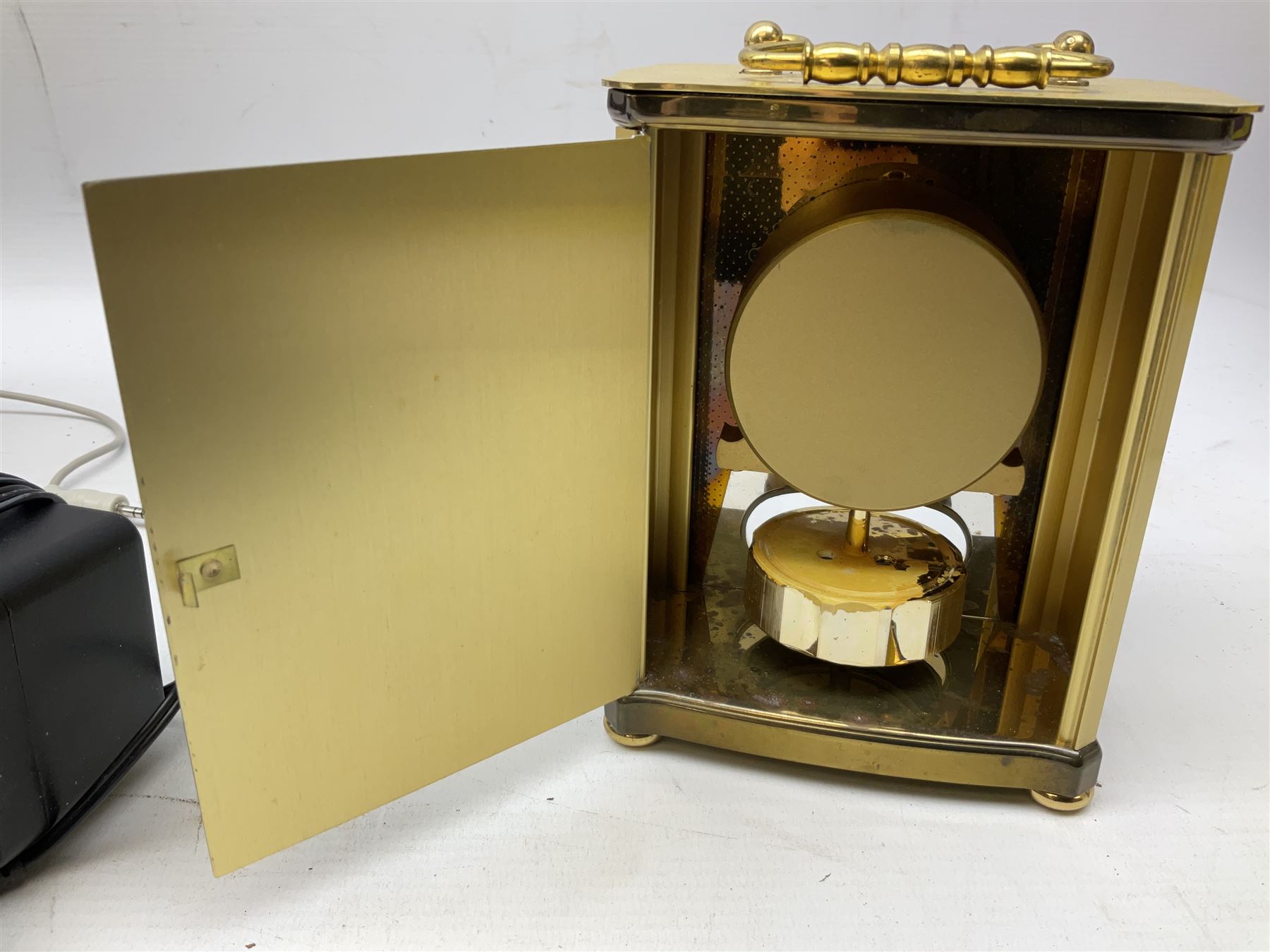 Pure Digital Evoke-1XT DAB digital radio and additional speaker, together with Quartz mantel clock