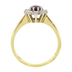 18ct gold oval cut ruby and round brilliant cut diamond cluster ring, London 1976, ruby approx 0.45 carat, total diamond weight approx 0.30 carat