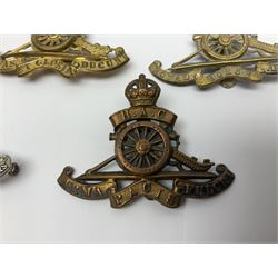 Twelve cap badges including Royal Artillery, 3rd RGA Middlesex Volunteers, Hon. Artillery Company, West Riding and Waraickshire Royal Horse Artillery, Royal Engineers and Army Service Corps (12)