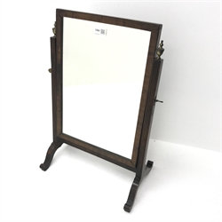 Edwardian mahogany toilet swing mirror, reeded supports on scrolling feet (W43cm, H58cm) and a mahogany magazine rack(W44cm, H39cm, D29cm)