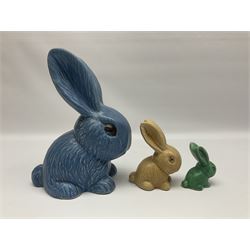 Three graduating Sylvac style rabbits, to include large blue example and two smaller green and brown examples, tallest H25cm