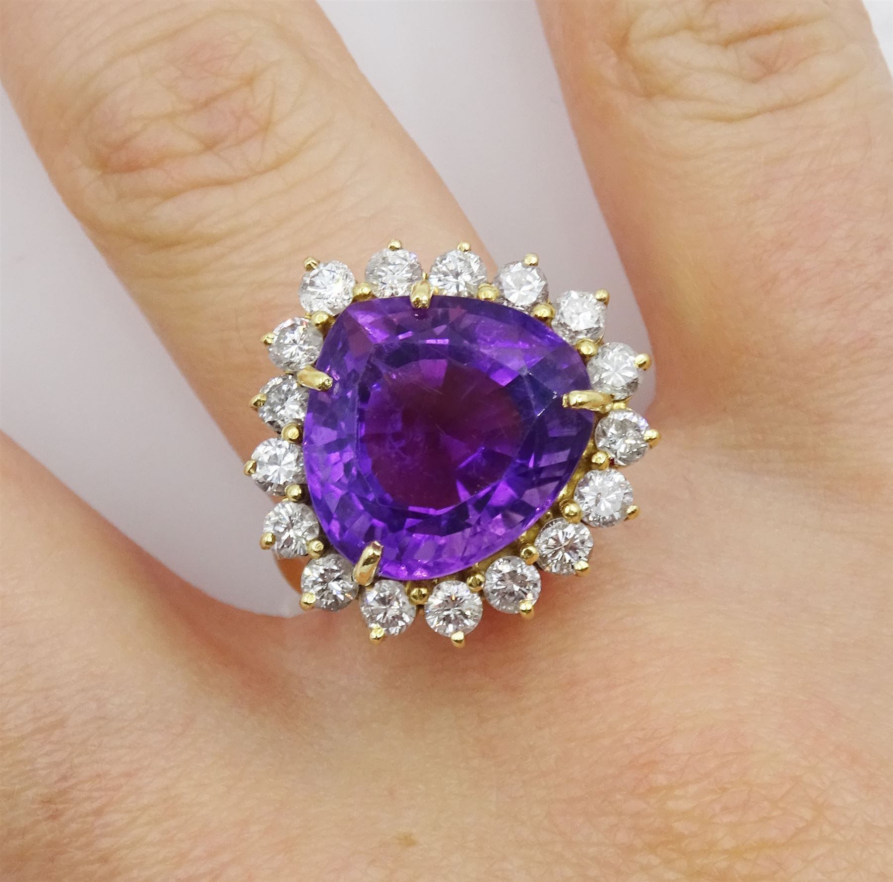 18ct gold amethyst and round brilliant cut diamond cluster ring, amethyst approx 8.00 carat, total diamond weight approx 1.30 carat