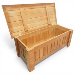 Light oak panelled blanket box, hinged top