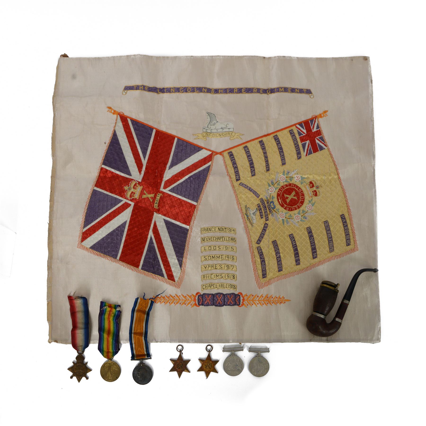 WWI medal trio, war medal, victory medal and 1914-15 star, WWII medals War medal, Defence Metal 1939-45 Star and The France and Germany Star, awarded to 8290 Pte A. Pearson Linc.R, together with his military pipe, engraved and WWI military silk for Lincolnshire regiment
