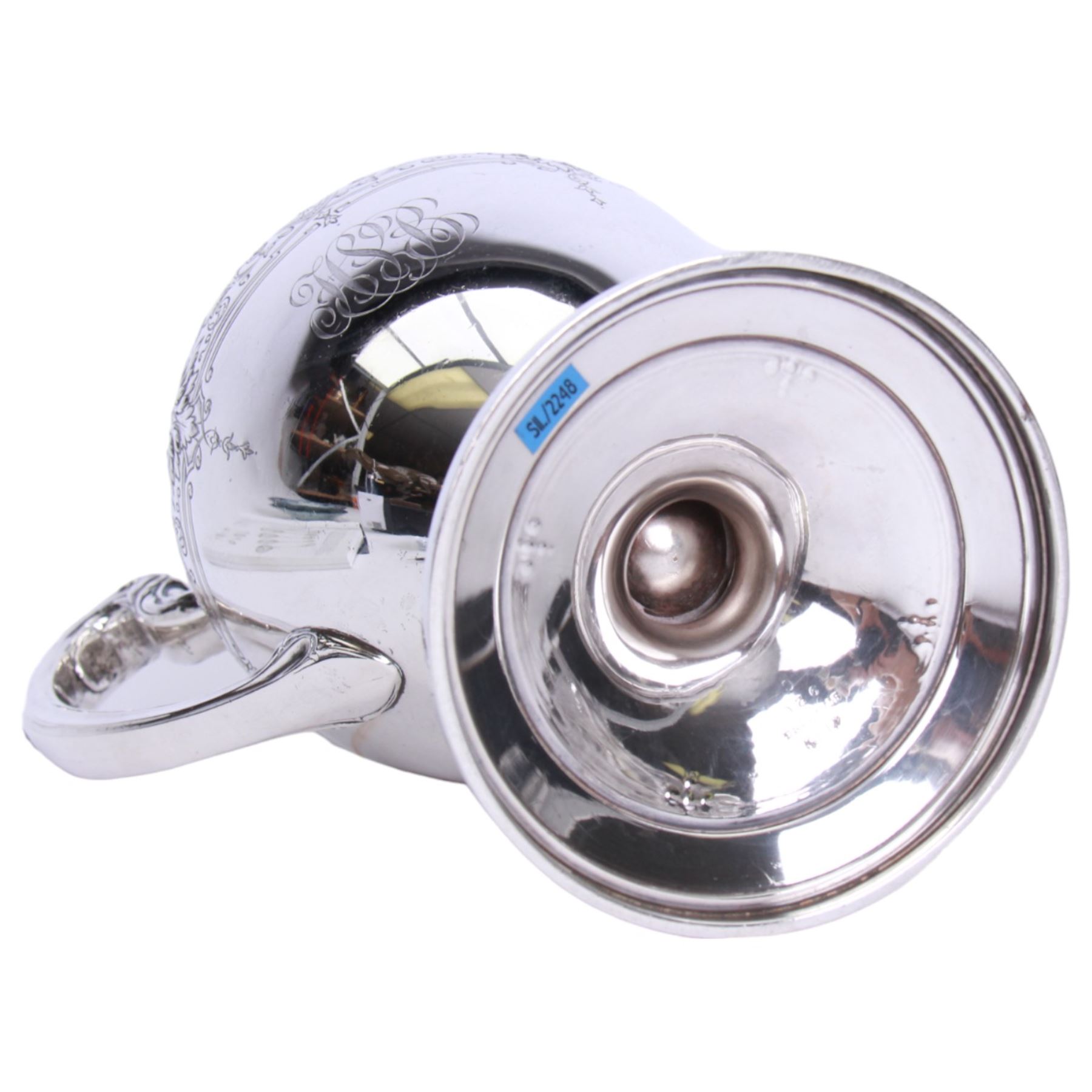 Large late 19th/early 20th century American silver pitcher, the body of ovoid form with embossed and chased foliate band, and acanthus capped scroll handle, upon a spreading circular foot with stiff leaf border, marked for Reed & Barton, Taunton, Massachusetts, and stamped Sterling, H27cm

