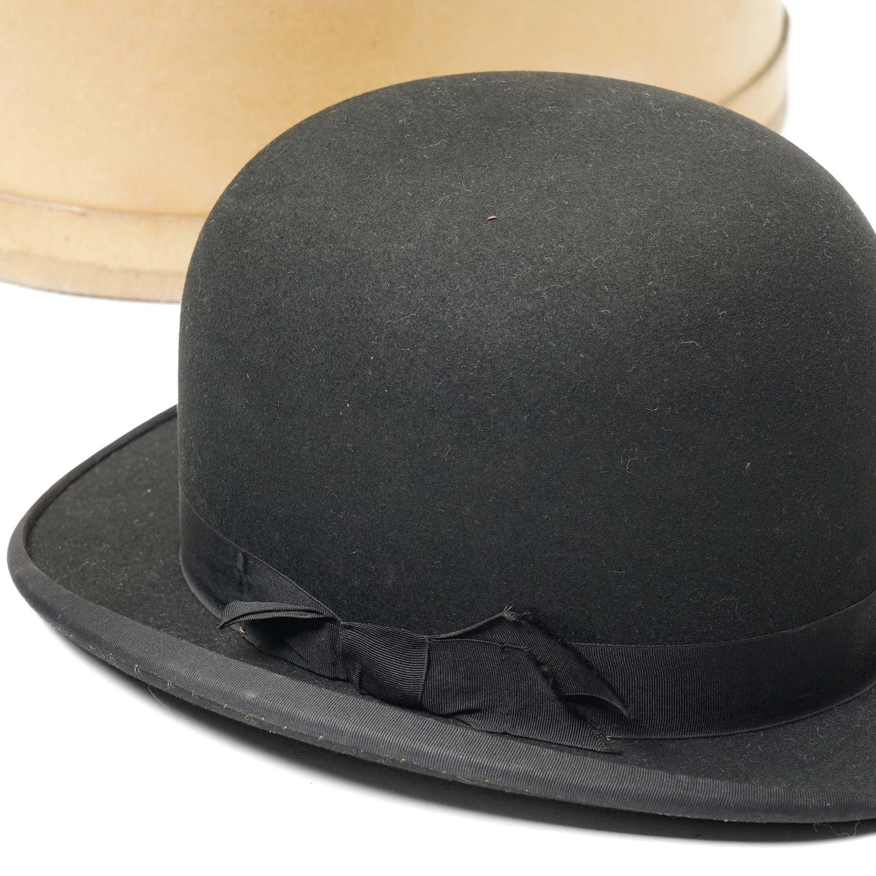 Three bowler hats and two cases, by Tress & Co, Lincoln Bennett & Co, and Christys' (3)
