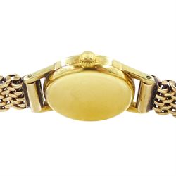 Omega ladies 18ct gold manual wind wristwatch, Cal. 244, silvered dial with baton hour markers, Helvetia hallmark, on 9ct gold bracelet, with fold-over clasp, Birmingham 1990