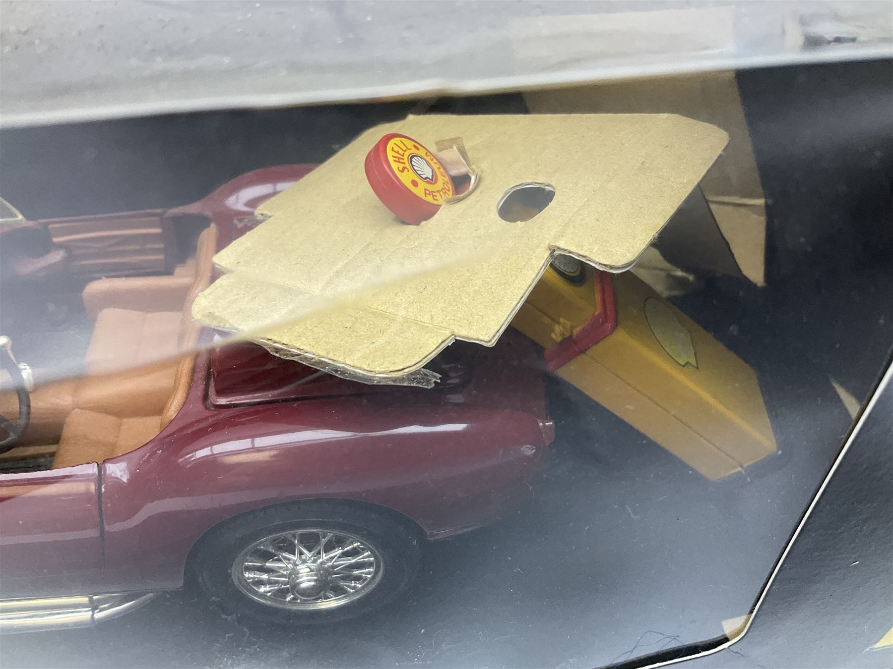 Two Collezione Classico large scale die-cast models of a Ferrari 1972 312P with Racing Fuel Pump and Ferrari 1958 250 Testa Rossa with Road Fuel Pump; and two Minichamps 1:18 scale models of a McLaren Mercedes Racing Car and Auto Union Typ C racing car; all boxed (4)