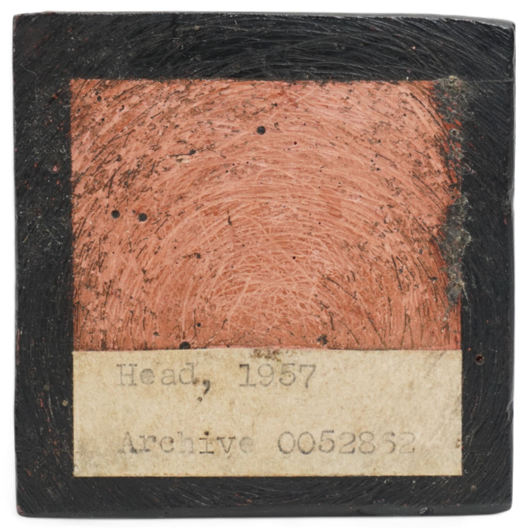 After Henry Moore (British 1898-1986): 'Head', plaster maquette sculpture, base marked with affixed catalogue label inscribed 'Head: 1957 Archive 0052852', W6.5cm H11cm