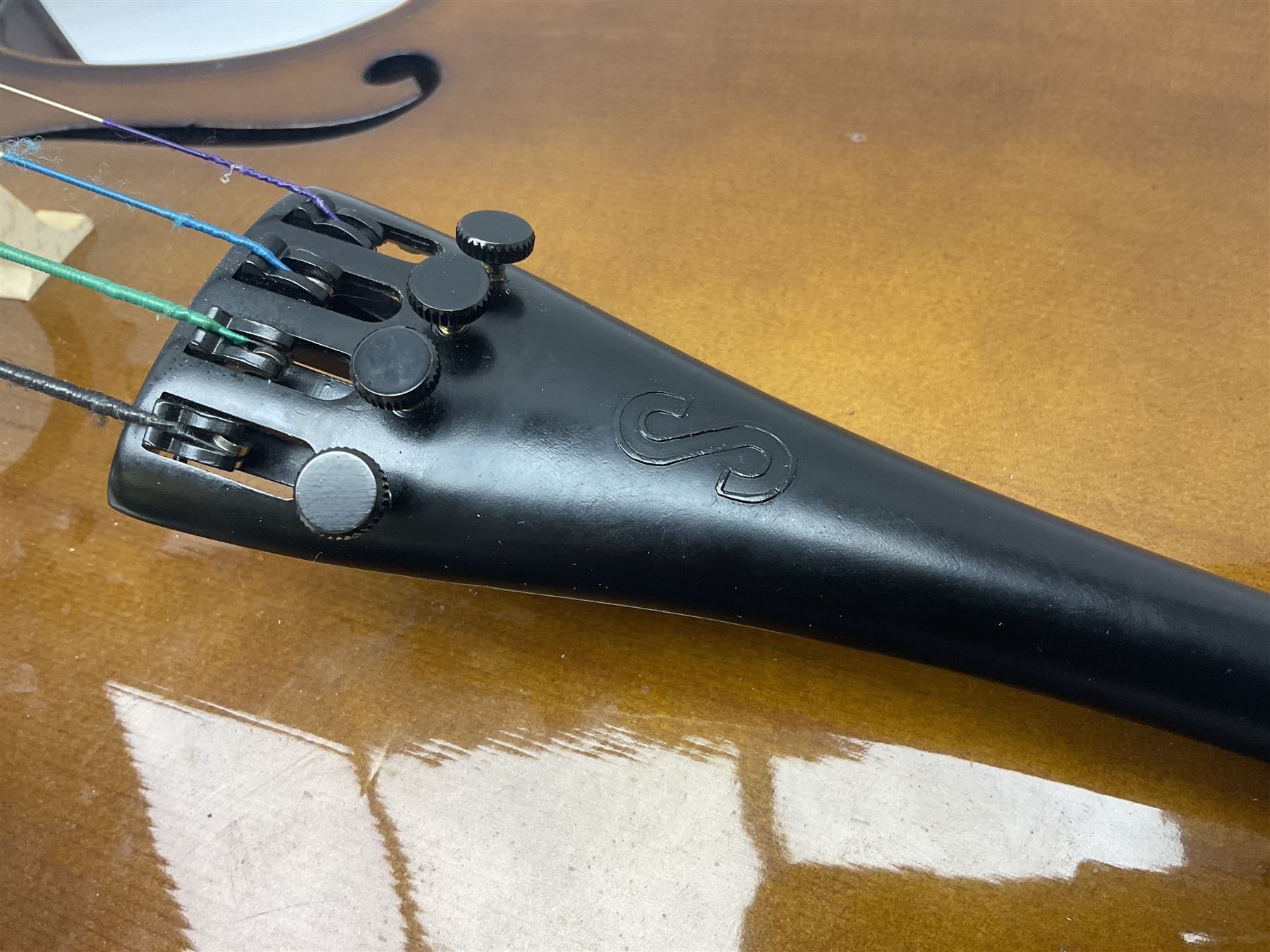 Stentor Student I quarter-size cello with 59.5cm two-piece maple back and ribs and spruce top; bears maker's label with serial no.M076096 L95.5cm overall; in Stentor soft carrying case with bow