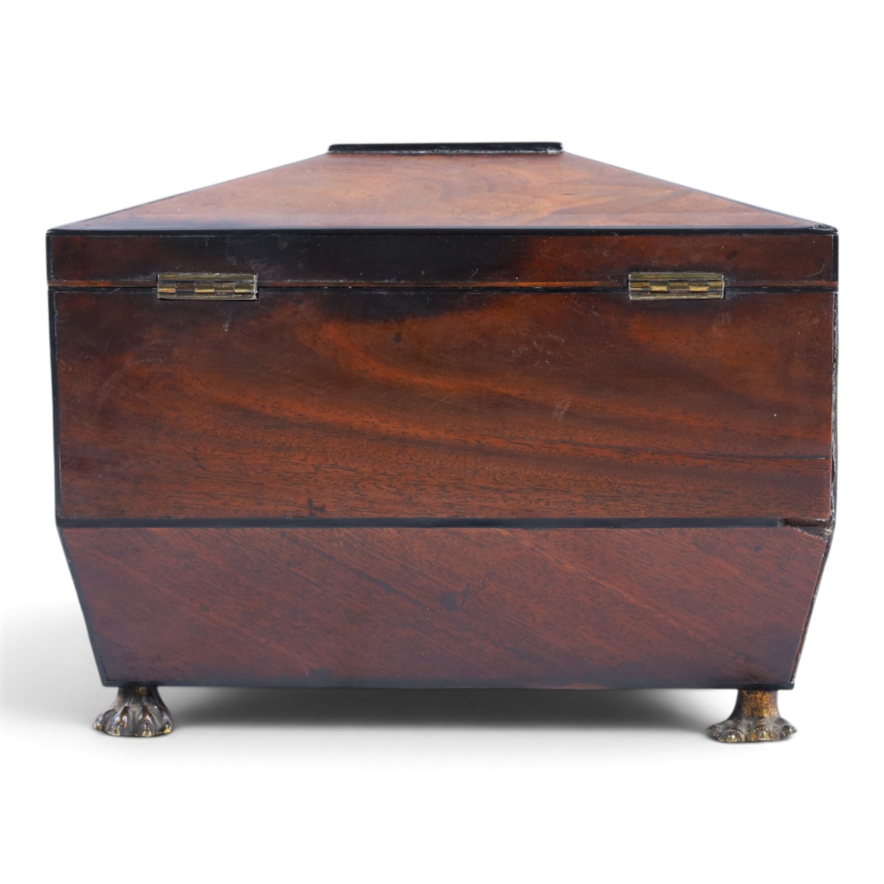 Regency mahogany sarcophagus tea caddy, the hinged lid opening to reveal two compartments, upon paw feet, H18cm