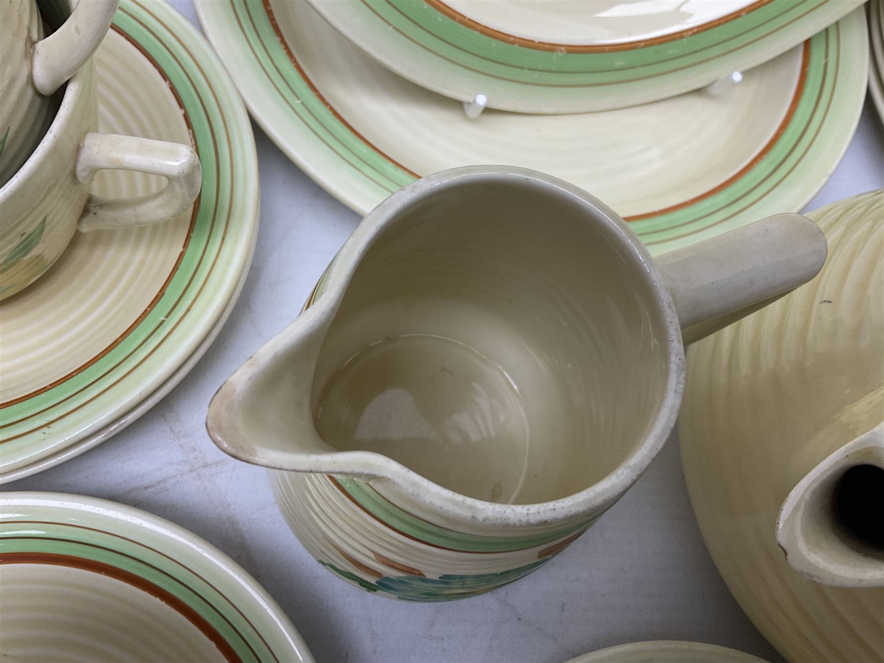 Wilkinson Clarice Cliff honeydew pattern tea service for eight, comprising teapot, milk jug, open sucrier, teacup and saucers, dessert plates and two side plates (29)