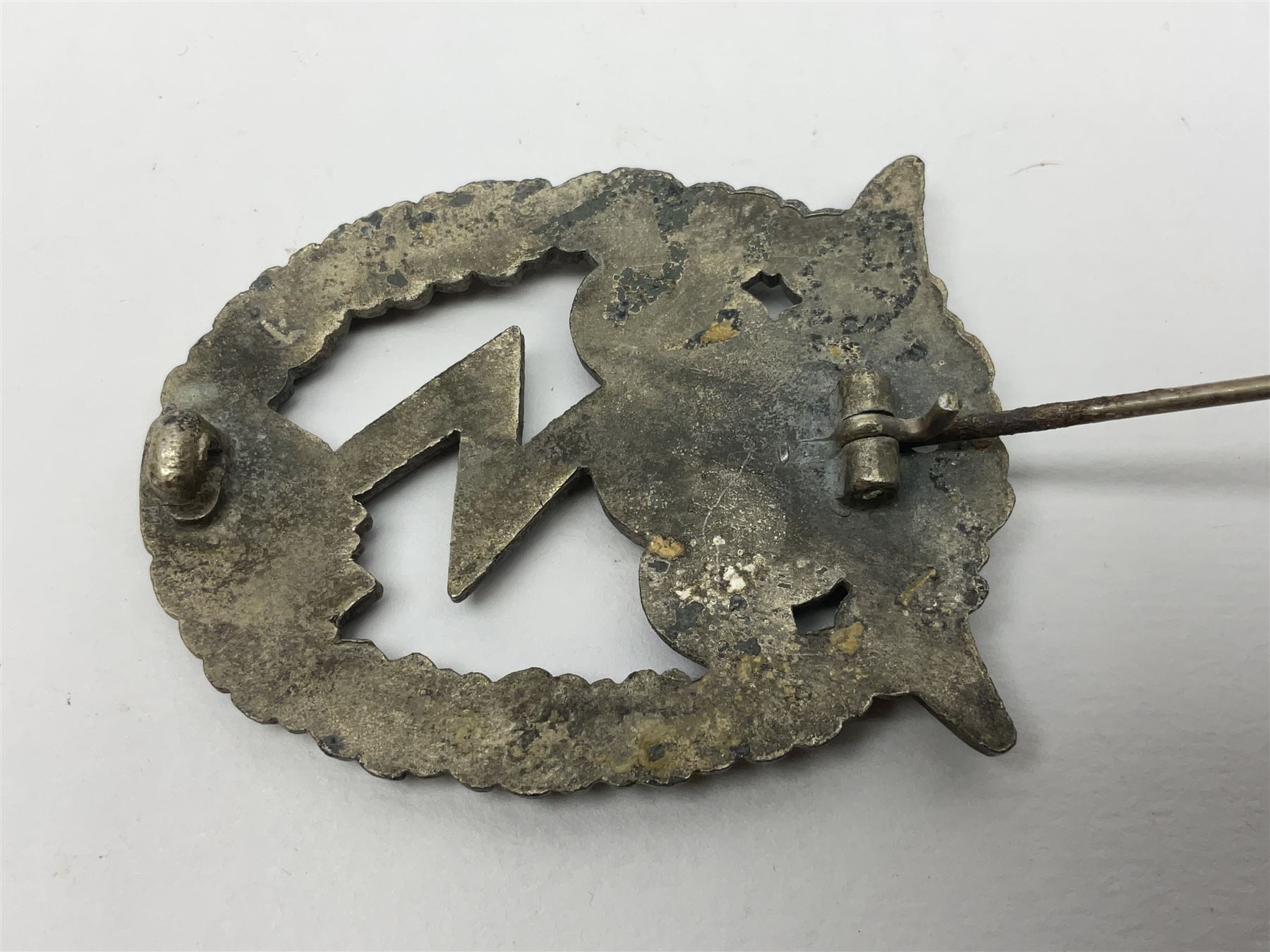 Two WW2 German Luftwaffe Ground Assault/Combat badges - one with flat pin and maker's mark M.u.K.; the other unmarked with round pin (2)