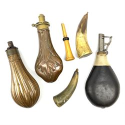 James Dixon & Sons copper and brass powder flask embossed with leaves H20cm; another copper powder flask with fluted decoration; two powder horns with stoppers; leather shot flask; and boxwood duck call (6)
