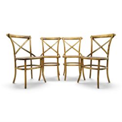 Set of four Oka style rattan dining chairs, bentwood frames inset rattan seat