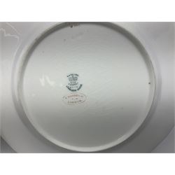 Coalport cobalt blue batwing pattern tea wares, decorated with finely enamelled floral sprays within gilt reserves, comprising teacup trio, coffee can and saucer and other cup and saucer, twin handled cake plate, milk jug and open sucrier, and circular plate retailed by T. Goode & Co London, pattern no Y2665,  all with green Coalport AD 1750 marks beneath, largest W26cm (11)