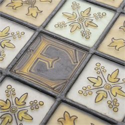 Edwardian stained glass panel, with central painted E motif surrounded by flowers and Yorkshire roses, H47cm