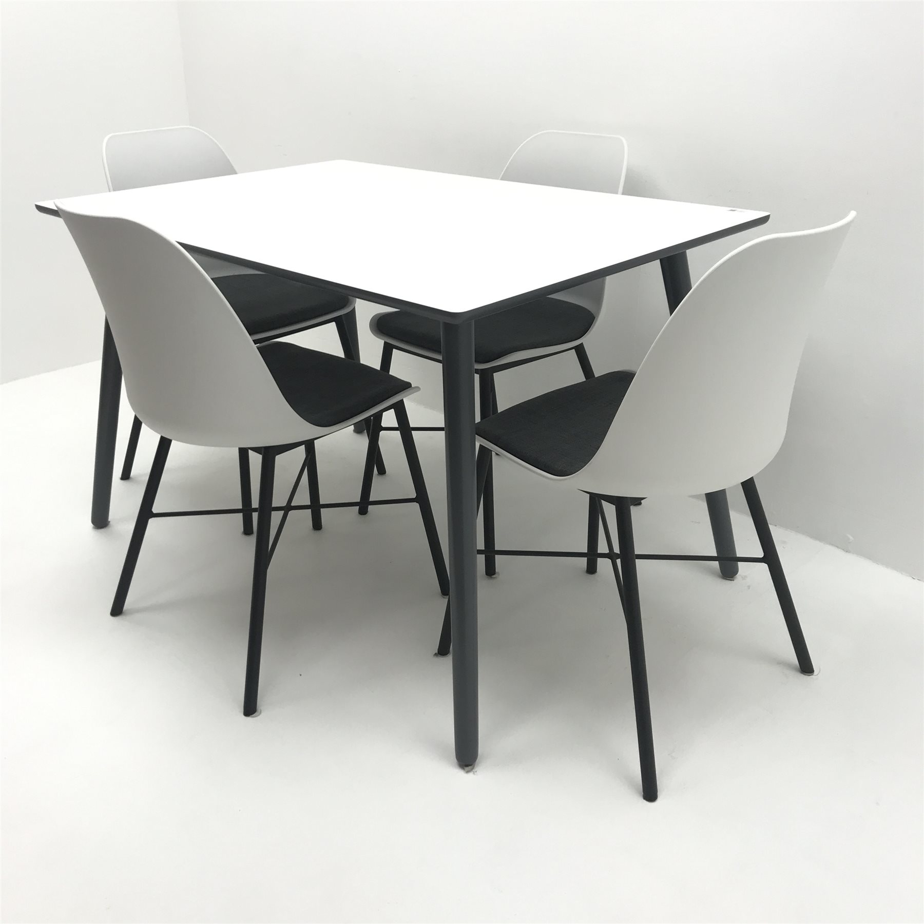 John Lewis white rectangular dining table, grey turned tapering supports (W120cm, H74cm, D80cm) and four matching dining chairs, upholstered seats, turned supports (W43cm) 