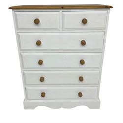 Painted pine chest, fitted with two short over four long drawers with turned wooden handles, in white finish