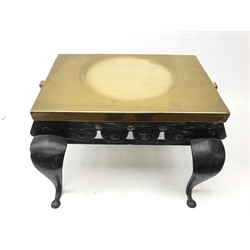 19th century brass and iron footman, the rectangular top with two carry handles above a shaped apron, raised upon four legs, the front two of bulbous cabriole form, W48cm, H30cm   
