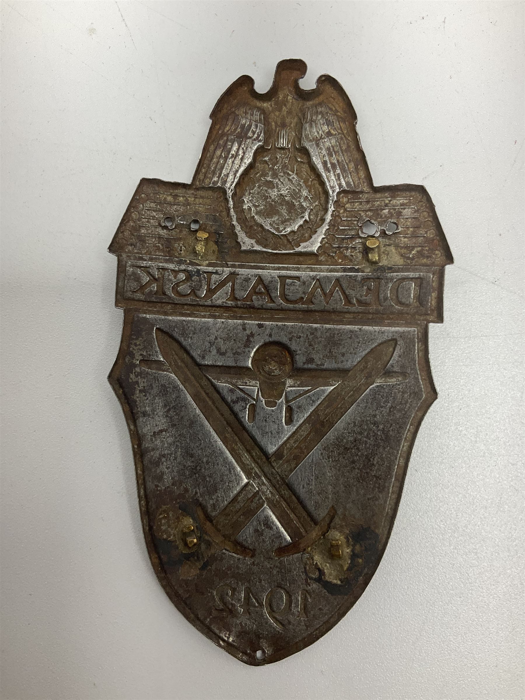 Two German Arm-Shield badges - one Russian Front marked Demjansk 1942; the other marked Narvik 1940 (2)