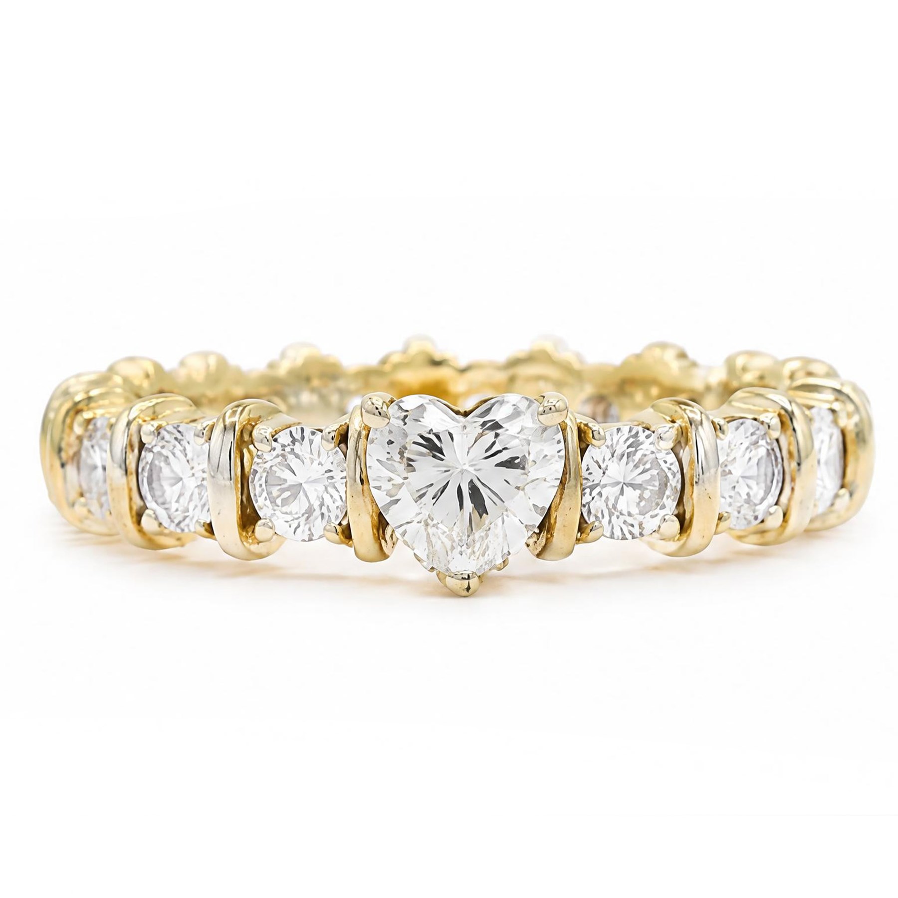 18ct gold diamond eternity ring, set with a single heart cut diamond of approx 0.50 carat and sixteen round brilliant cut diamonds, total diamond weight approx 1.95 carat