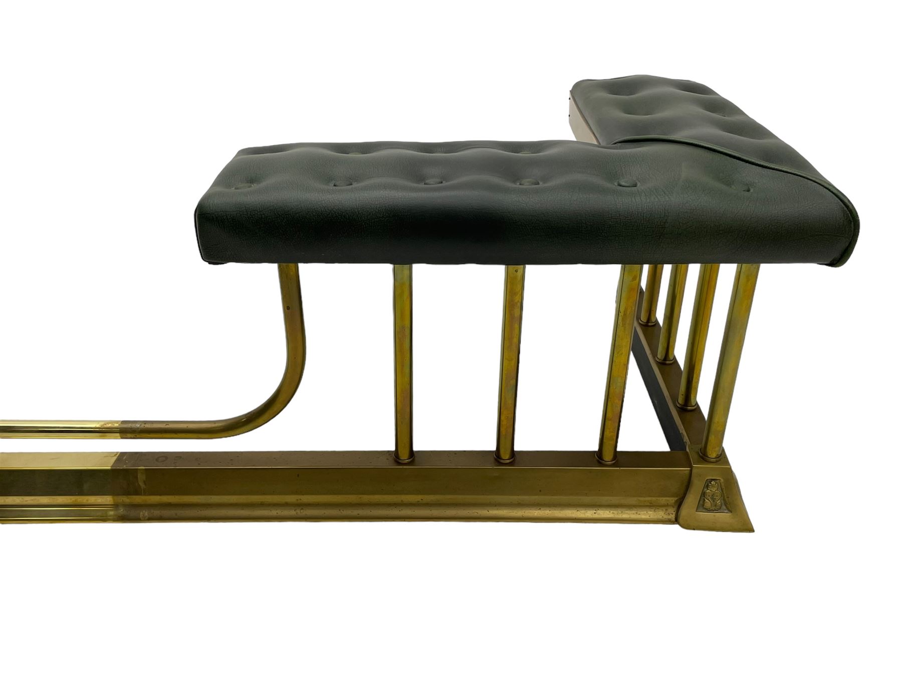 Victorian design brass telescopic extending club fire fender, the corner seats upholstered in buttoned green fabric over plain balustrade, on moulded base with floral cast corner brackets 