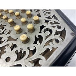 19th century Lachenal concertina of hexagonal form with fretworked nickel ends and thirty-four plus one bone buttons; straps marked Lachenal & Co Makers London and wooden handle stamped English Make Trade Mark L16cm