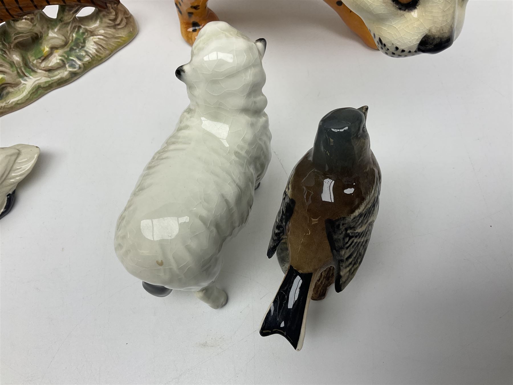 Group of Beswick figures to include leopard no 1082, rabbits, swan, pheasant no 1226 etc, all with marks beneath