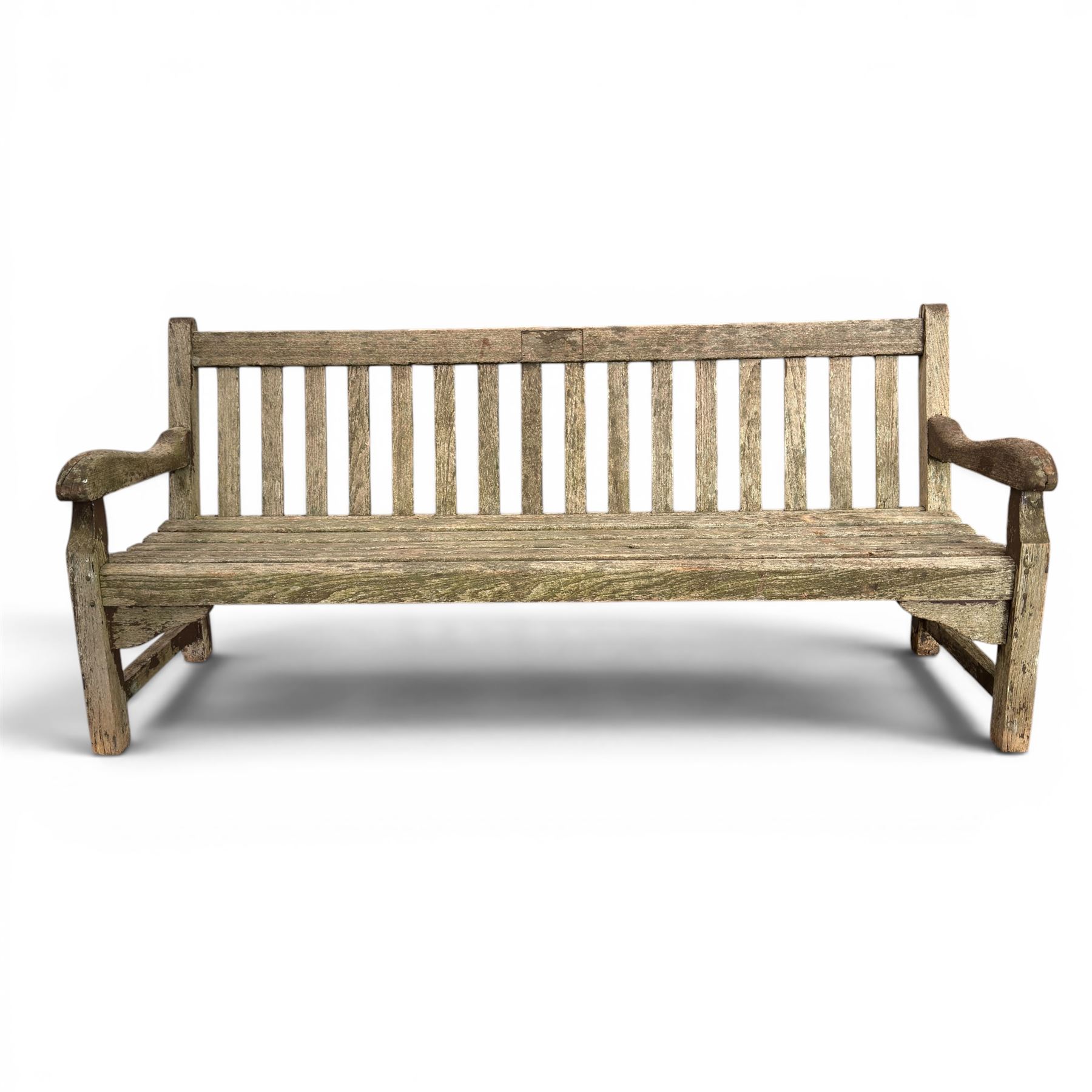 Teak garden bench with slatted back and seat raised on square supports