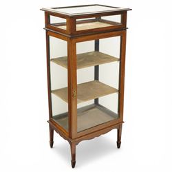 Edwardian inlaid mahogany glass cabinet with bijouterie upper section, four tier design with velvet lined interior shaped apron raised on spade feet