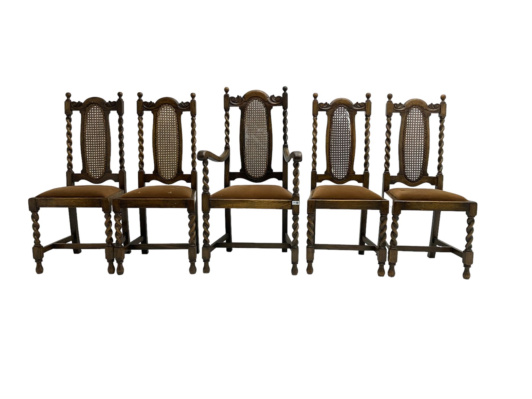 Set five early 20th oak barley twist dining chairs, spiral turned supports with oval cane-work backs, drop-in upholstered seats, on spiral turned supports joined by plain stretchers 