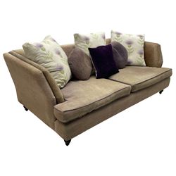 John Sankey - grande two-seat contemporary shape hardwood-framed sofa, upholstered in leather and fabric with contrasting scatter cushions in pale ground fabric decorated with thistles, on turned front feet