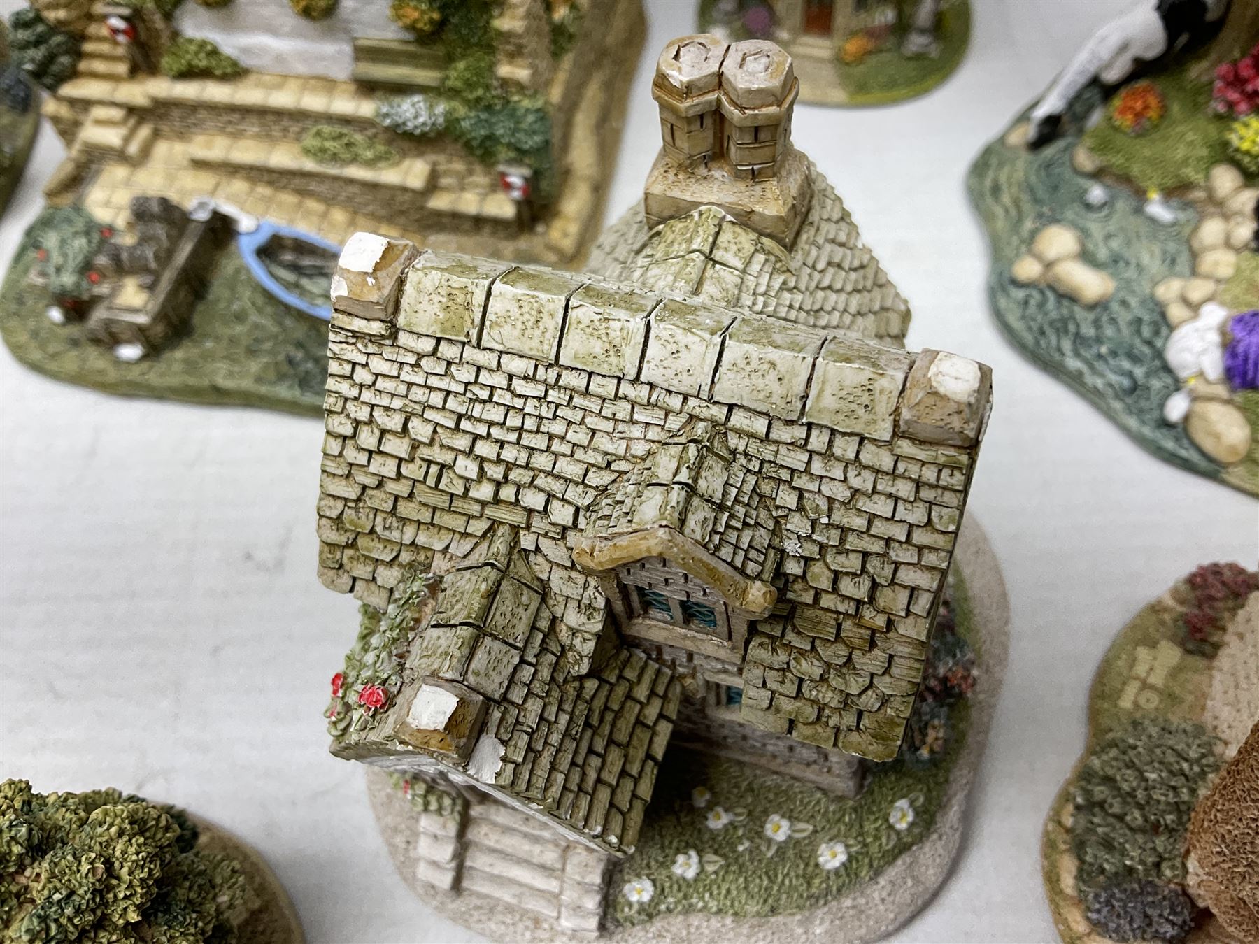 Sixteen Lilliput Lanes, to include The Golden Jubilee, Round Tower - Windsor Castle, Castle of the Golden Chalice, Travellers Rest, with box and deed,  Summer Days, Sunshine Creek, Writing with Lewis Carol, with box and deed,  etc 