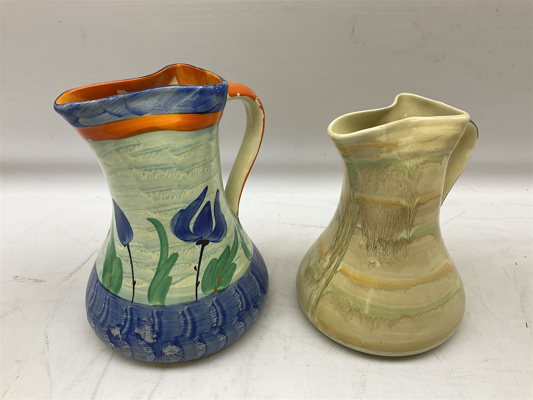 Seven Myott Son & Co hand painted jugs, all with printed mark beneath, H21cm