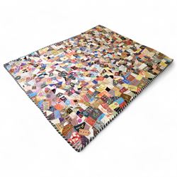 Victorian crazy pattern patchwork quilt, of irregular scraps, within a silk and lace border, L174cm, W134cm