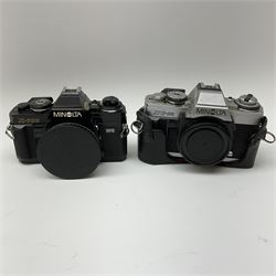 Minolta X700 camera body and Minolta XGM camera body, Tamron 'SP 60-300mm f3.8-5.4' lens, Tamron 'SP 35-80mm f2.8-3.8' lens', Tamron 'SP 500mm 1:8' CF tele macro catadioptric lens and various accessories including filters, tele-converter, flash etc