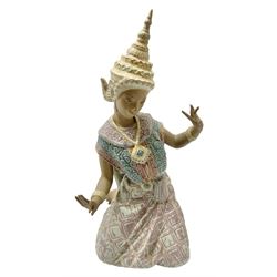 Lladro figure, Thai Dancer, modelled as a dancer kneeling, sculpted by Vincente Martinez, no 2069, year issued 1977, year retired 1999, H45cm