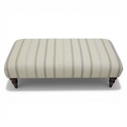 Footstool upholstered in striped fabric, with turned dark stained tapered feet