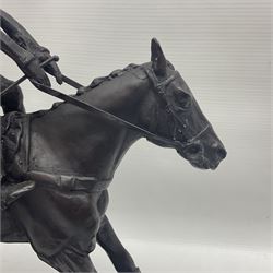 Bronze, modelled as racehorse and jockey jumping a hurdle, on a naturalistic base and shaped black marble plinth, overall H32cm
