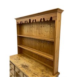 Victorian pine dresser, fitted with seven drawers and dog kennel cupboard, two heights plate rack