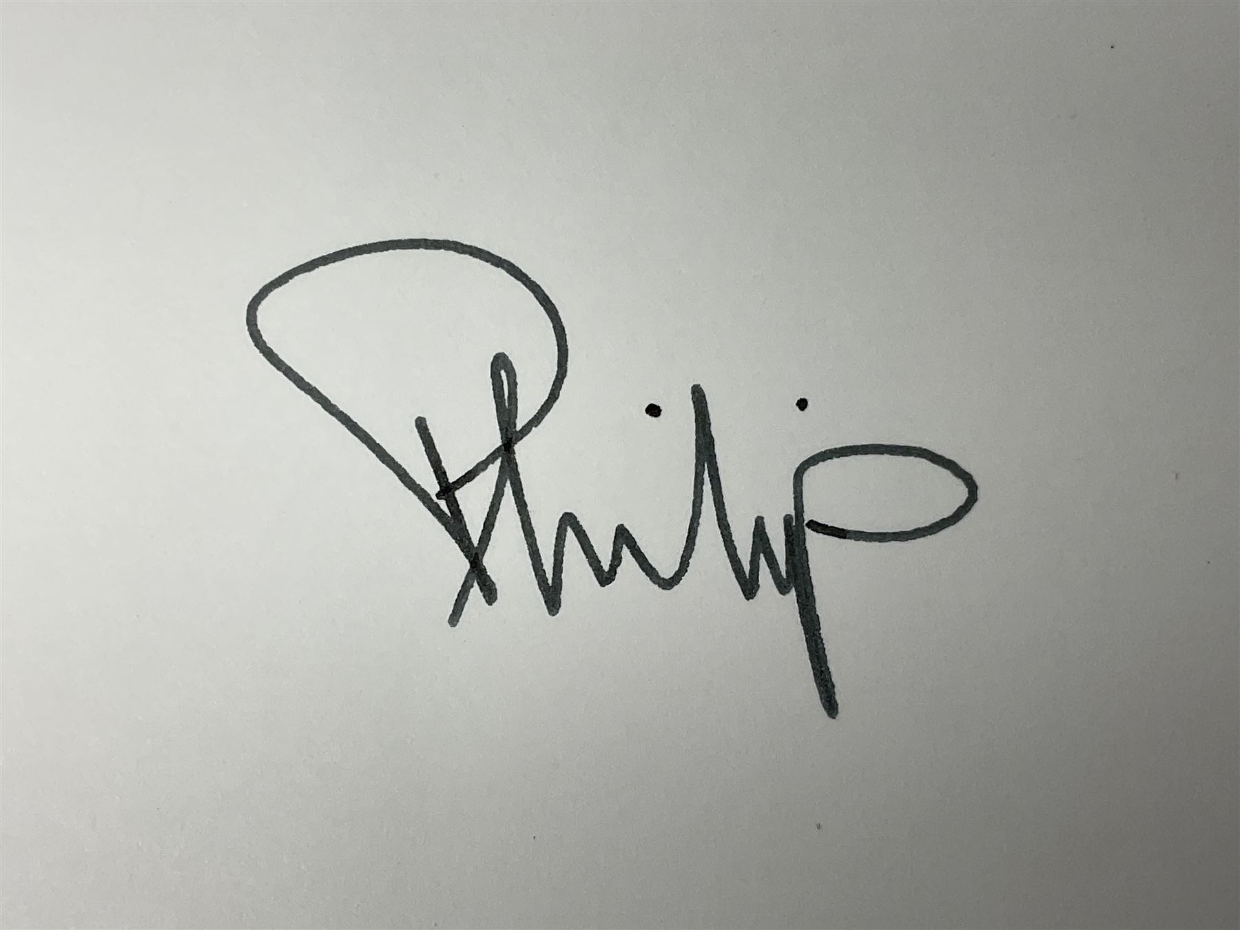 HM Queen Elizabeth II and HRH the Duke of Edinburgh - signed 1997 Christmas card with two gilt cyphers to front and colour photographic portrait inside,  signed Elizabeth R and Philip with manuscript date 1997 below