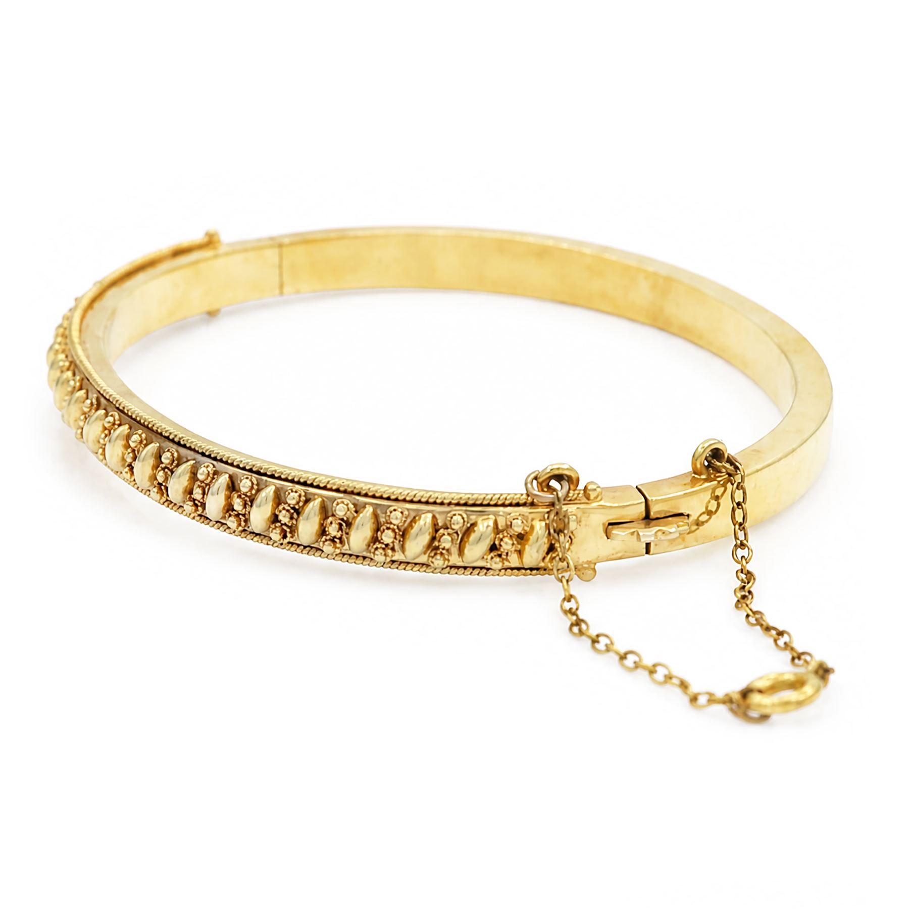 14ct gold hinged bangle, with beaded and rope twist decoration, London import mark 1989